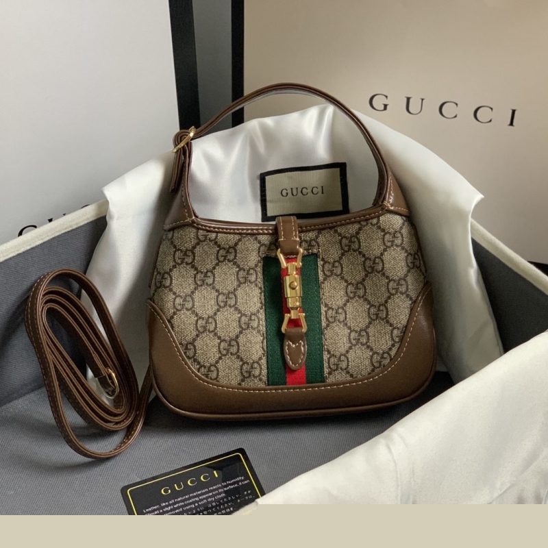 G*u*i top handle bags